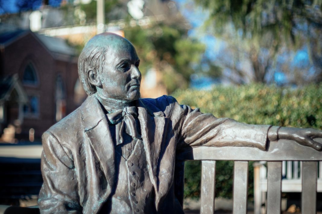 statue of jesse mercer sitting on a bench