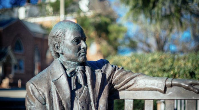 Legislative Leaders to Tour Medical School statue of jesse mercer sitting on a bench