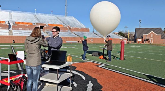 School of Engineering team to participate in nationwide eclipse ballooning project students prepare to launch a weather balloon