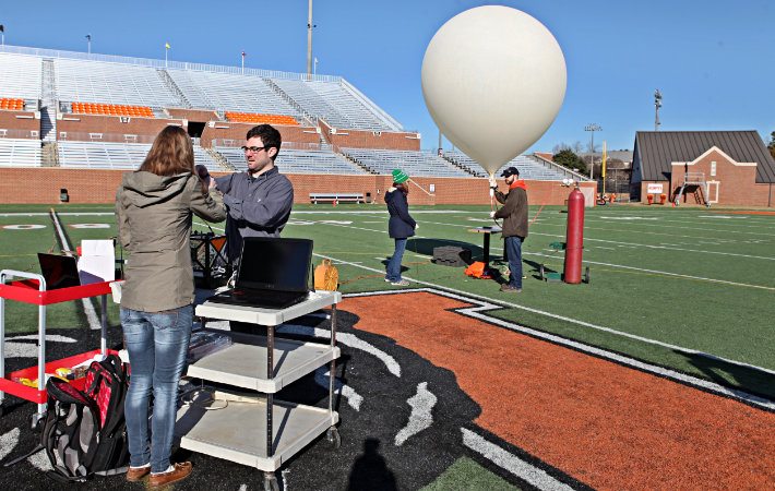 students prepare to launch a weather balloon