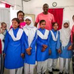 Mercer On Mission India group works with students