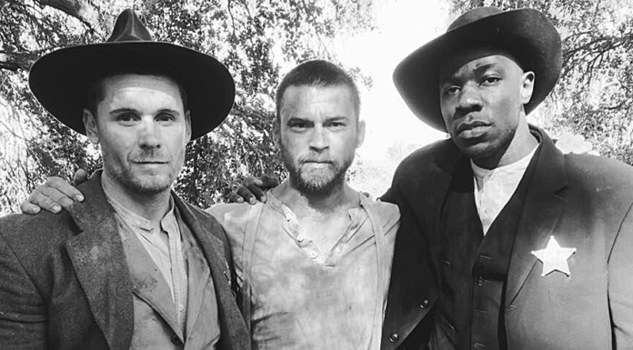 Mercer Memories: William Mark McCullough, CLA Mercer alum William Mark McCullough, center, is pictured with Linc Hand and McKinley Belcher III on the set of the western film "Burning Kansas."