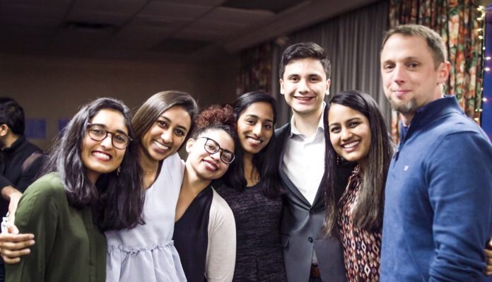 Shailey Shah and Robyn Guru, at left, co-organizers of Real Talk: Student Edition, are pictured with the five student speakers for the December 2018 event. ABOVE: