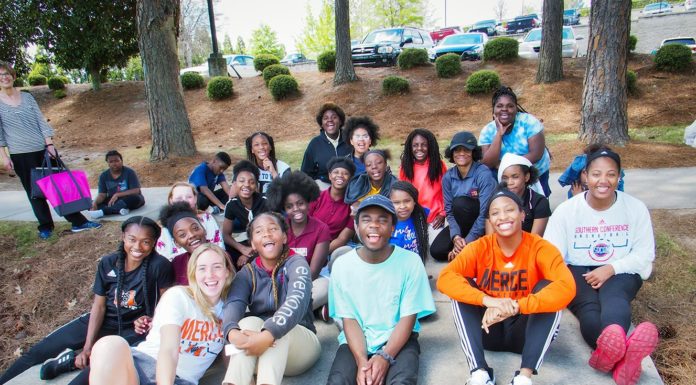 Mentorship program helps middle-schoolers plan for the future Mercer University students and Ballard Hudson Middle students in the Mercer Mentors program are pictured during a campus visit in April.