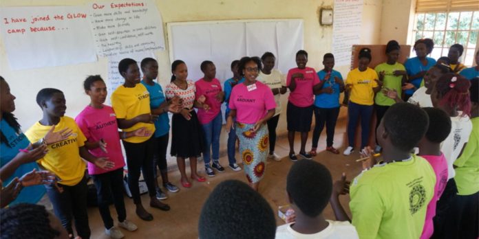 Mercer Peace Corps volunteer Kayla Beasley works with girls in Uganda.