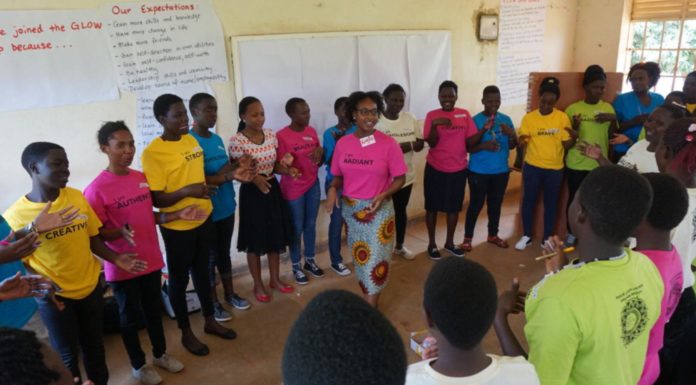 Mercer alumna promotes HIV prevention in Uganda as Peace Corps volunteer Mercer Peace Corps volunteer Kayla Beasley works with girls in Uganda.