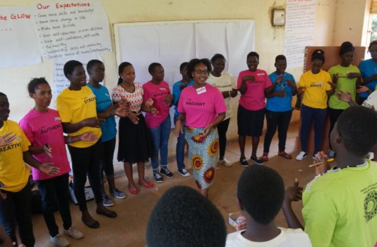 Mercer Peace Corps volunteer Kayla Beasley works with girls in Uganda.