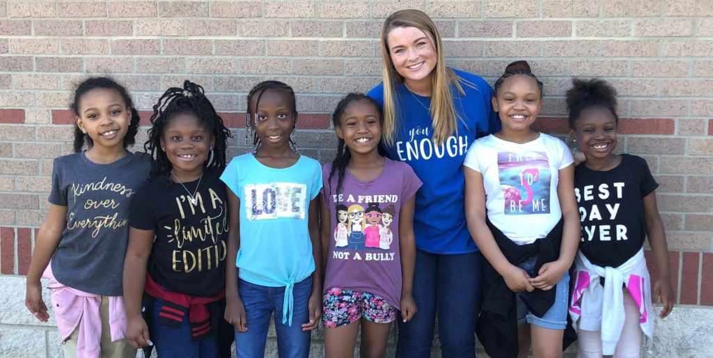 Mercer alumna Kate Christian and students in her third-grade class are shown wearing their "positivi-tees."