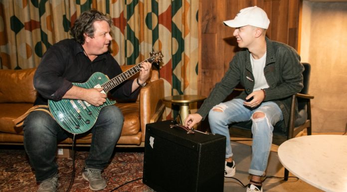 Mercer student builds boutique tube guitar amplifier for revived Capricorn studios Mercer Music at Capricorn Chief Engineer Rob Evans plays a guitar that's hooked up to the guitar amplifier built by Mercer student Maison Clouatre