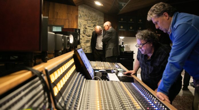 Mercer Music at Capricorn’s API sound console merges classic and modern features Rob Evans and Steve Ivey work on the API sound console at Mercer Music at Capricorn