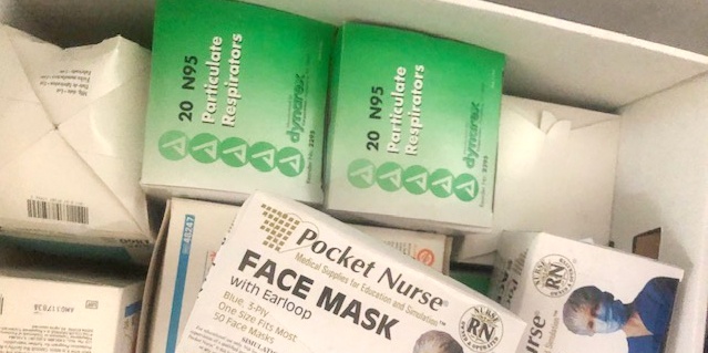 Boxes of face masks and other supplies