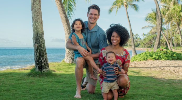 Mercer alums serving on front lines of pandemic as doctors Gianina Best and William Emerson are pictured with their children, Maya and Julius.