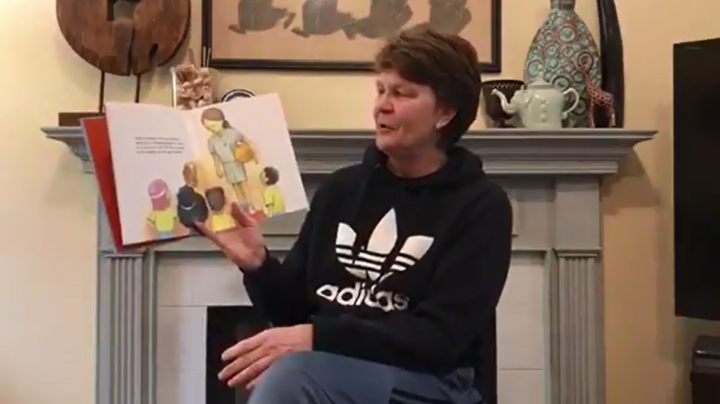 Coach Susie Gardner reads a book