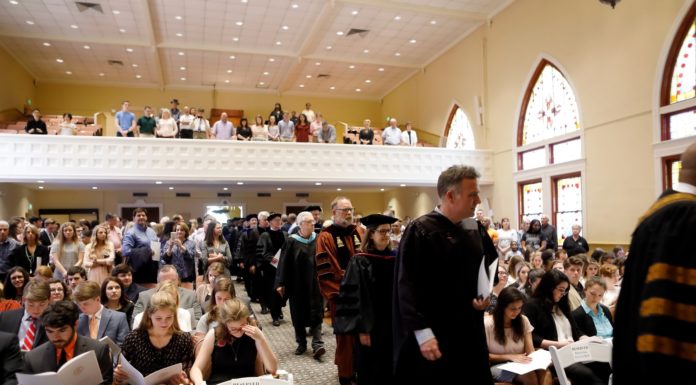 Mercer recognizes students receiving honors Faculty file in during honor convocation