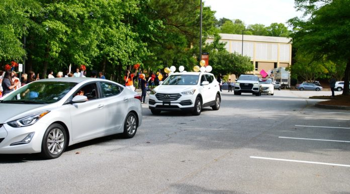 Mercer celebrates new nurses in drive-thru pinning parade Cars drive through pinning parade