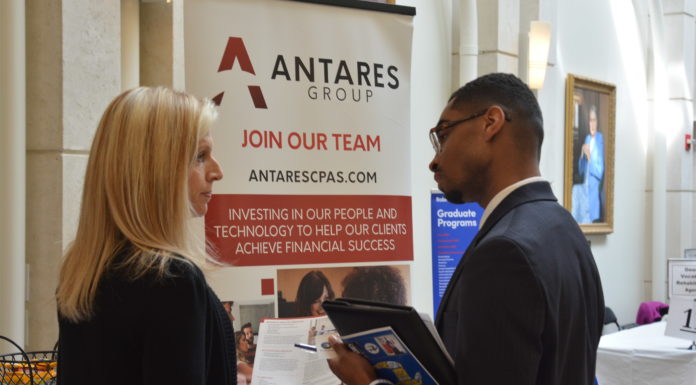 How COVID-19 is affecting the job market and what we can do about it People at a career fair