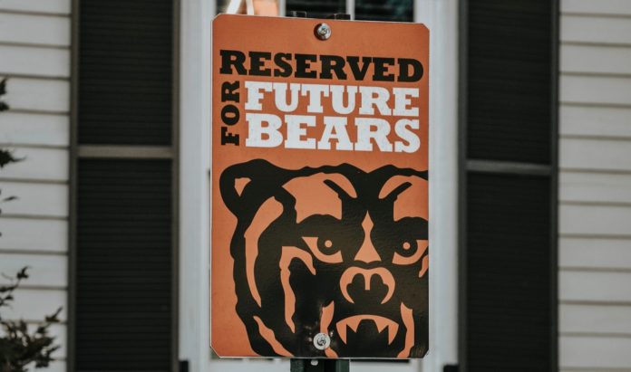 Parking sign that says: Reserved for Future Bears