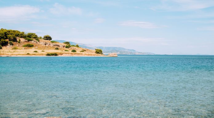 How to go on vacation while taking online classes | Ask Kelly Water with land in the distance