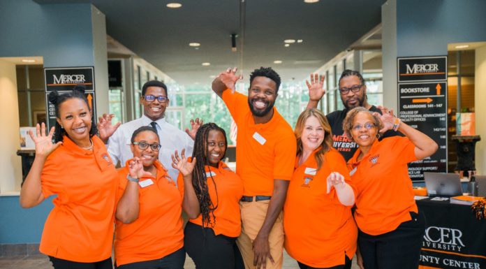 How, at 44, I learned the value of taking a chance | Ask Kelly Student ambassadors make hands into bear claws