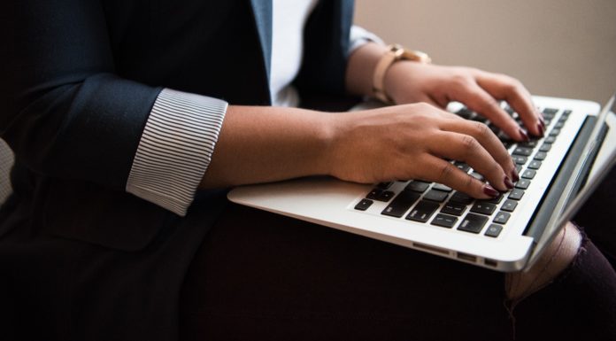 How to lead effectively during a crisis person using a macbook