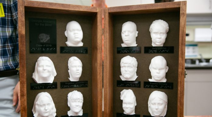 Engineering students, faculty create 3D yearbooks for the blind | Mercer Made 3D yearbook