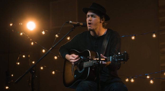 Mercer plumber’s true passion involves a different set of pipes | Beyond the Bear Crosby Adams plays guitar and sings on stage