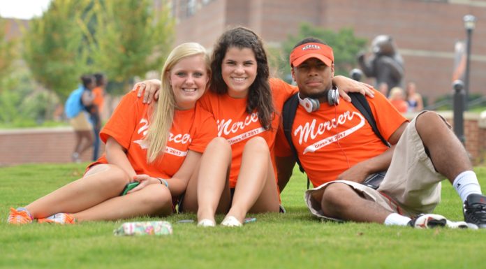As Mercerians, we should inspire each other | Ask Kelly Three students sit on Mercer's lawn