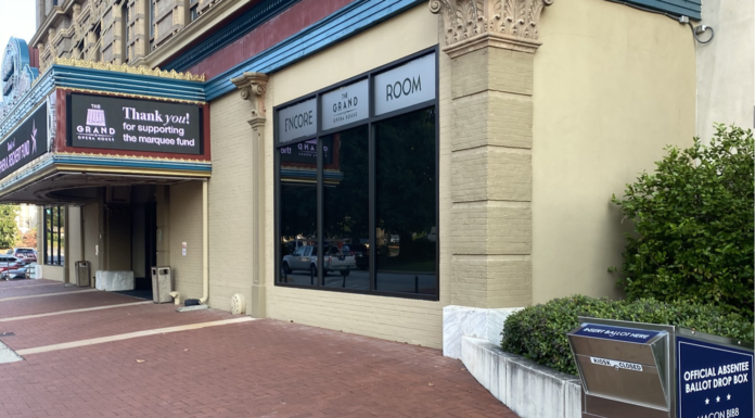 As absentee voting deadline looms, students encouraged to vote early and in person An absentee ballot drop box in front of The Grand Opera House