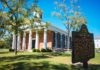 Mercer board elects new trustees, officers; approves degree in occupational therapy A historical marker noting "Old Mercer" is in front of a brick building with white columns