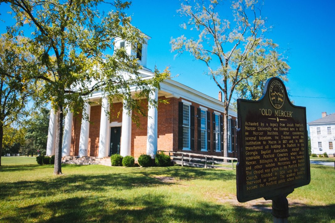 A historical marker noting "Old Mercer" is in front of a brick building with white columns