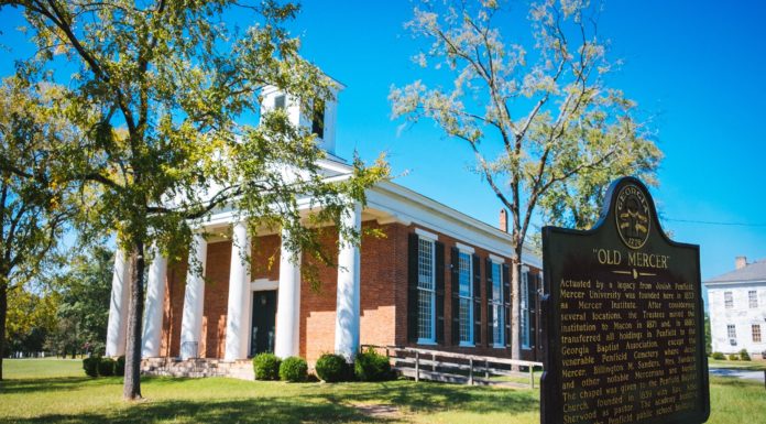 Mercer board elects new trustees, officers; approves degree in occupational therapy A historical marker noting "Old Mercer" is in front of a brick building with white columns