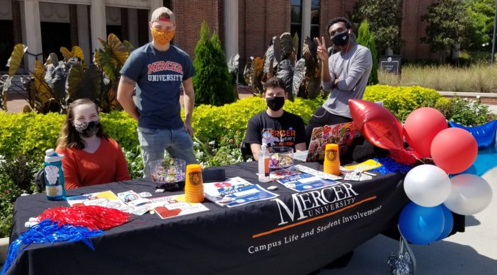 Political science students work to increase voter engagement | Classroom Spotlight Political science students set up on Cruz Plaza for National Voter Registration Day on Sept. 22, 2020.