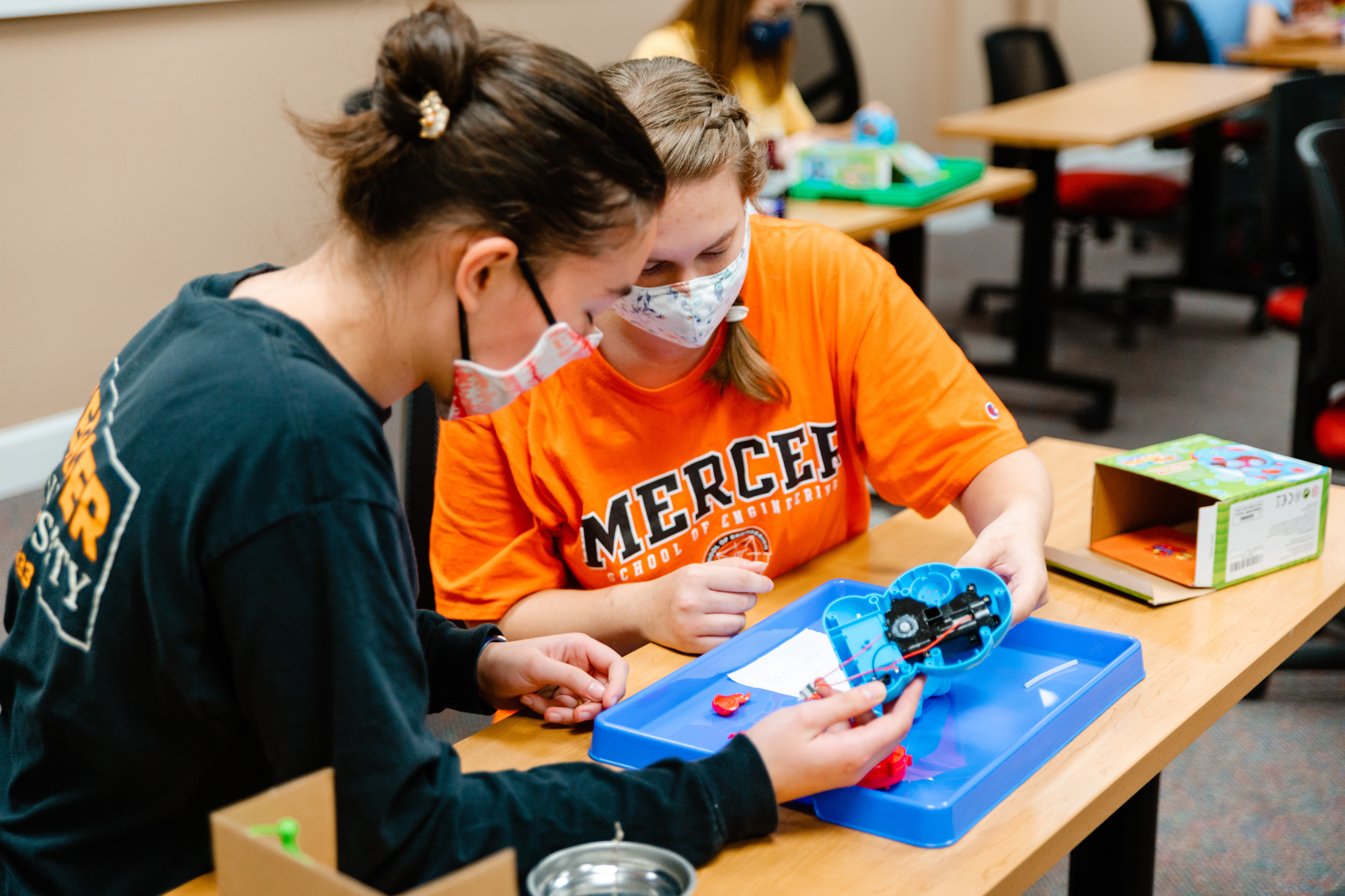 Engineering honors students work on the adaptive toys project during Dr. Phil McCreanor's class.