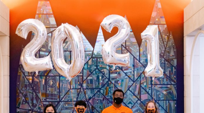 Rise above obstacles and apply lessons from 2020 to the new year | Ask Kelly Students wearing orange shirts hold 2021 balloons