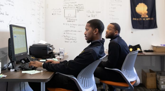 Mercer Innovation Center seeks student business ideas for competition two men look at a computer while sitting in an office at the mercer innovation center