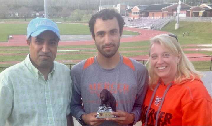 Abraham Balawi is pictured with his parents, Abdallah and Shannon.