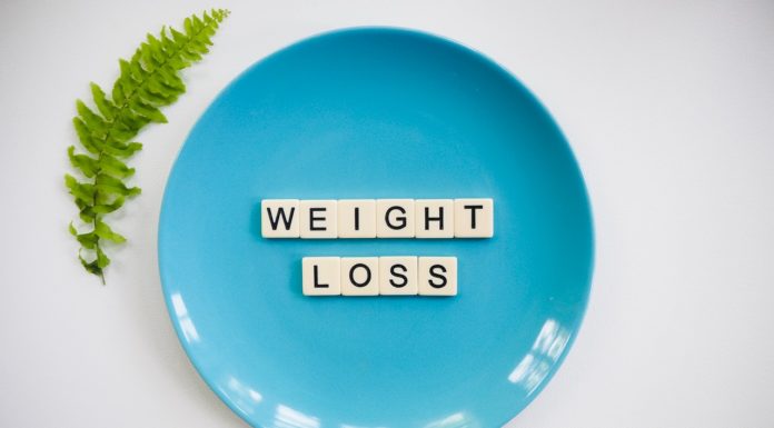 Pandemic weight gain is real. A diet journal can help you shed the ‘COVID 15’ blue plate has scrabble letters on it that spell out weight loss
