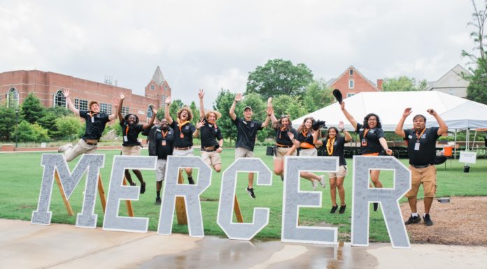Consider how taking a gap year could impact your future | Ask Kelly students jump behind letters that spell mercer