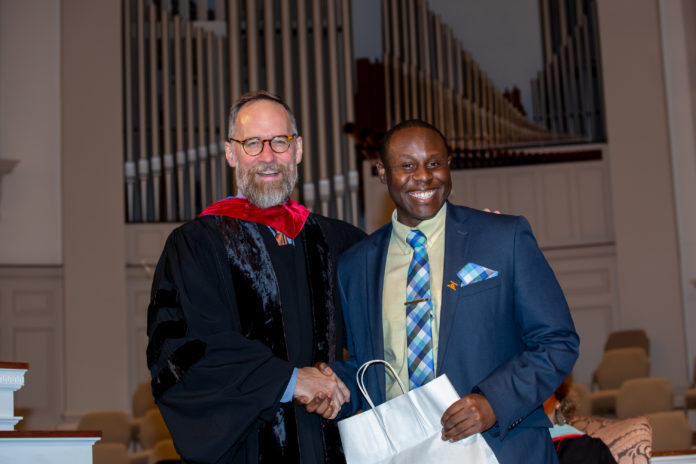 Jukabiea Barlow, left, is pictured with School of Theology Dean Dr. Greg DeLoach during the theology commissioning ceremony in May 2019.