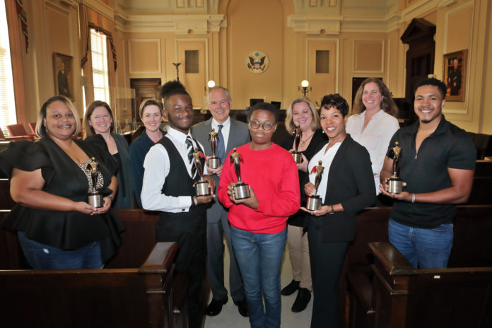 From left, Tonora Jones, whose daughter was the victim of random gun violence; Stephanie Shadden, director of photography and editor; Jessica Walden, producer and creative development; actor Julius Render; Judge Marc Treadwell, who serves the U.S. District Court for the Middle District of Georgia; actor Thomas Zachary Rutland; Karen Lambert, president of the Peyton Anderson Foundation; Middle District of Georgia Assistant U.S. Attorney Sonja Profit; director and producer Tabitha Walker of Big Hair Productions; and actor Jelani Perkins.