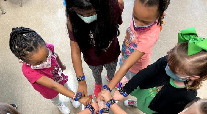 Alumnus’ education program combines academics with wellness, fosters love of learning | Mercer Made Students wear heart-rate monitors for Eduscize activities.