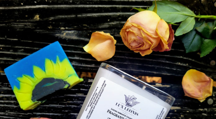 Mercer professor from Poland sells special soap, candle to benefit Ukrainian refugees Sunflower soap and world peace candle on a wooden table