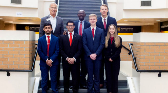 Finance students get real-world investing experience through Mercer fund Mercer's team won the Chartered Financial Analyst Institute Southern Classic Research Challenge in 2022. Front row (l-r): Premkumar J. Patel, Mark Bearden, Colin J. Lynch and Carolina Vilomar. Back row (l-r): industry mentor George Hauptfuhrer, faculty mentor Dr. Geoffrey Ngene and Martin Plukka. Photo courtesy Dr. Geoffrey Ngene