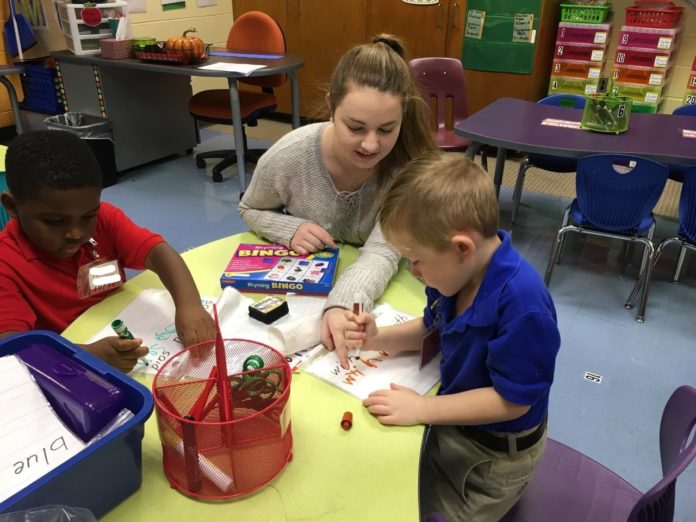 A Mercer student tutors at L.H. Williams Elementary during the 2018-19 school year.
