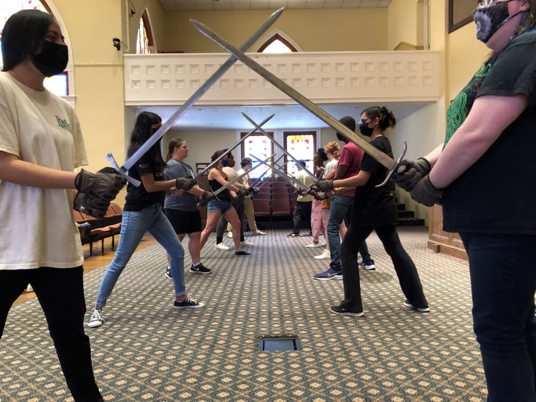 Mercer theater students learn how to sword fight in their stage combat course with theater director Scot Mann.