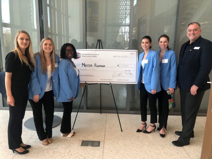 From left, Dr. Laura Boman, Martha Corrin Thompson, Aaryanna Mercer, Emma Drash, Olivia Korta and Dr. Marko Horn are shown at the SoCon Entrepreneurship Challenge at the Citadel in February 2022.