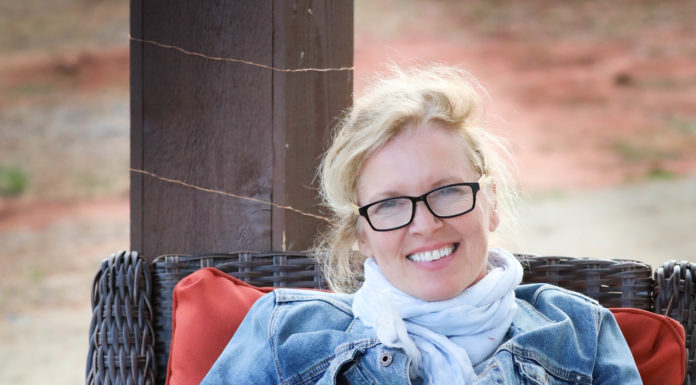 Mercer art professor chosen as Cherry Blossom Legacy Queen Mercer adjunct art professor Yvonne Gabriel is pictured with her two dogs.