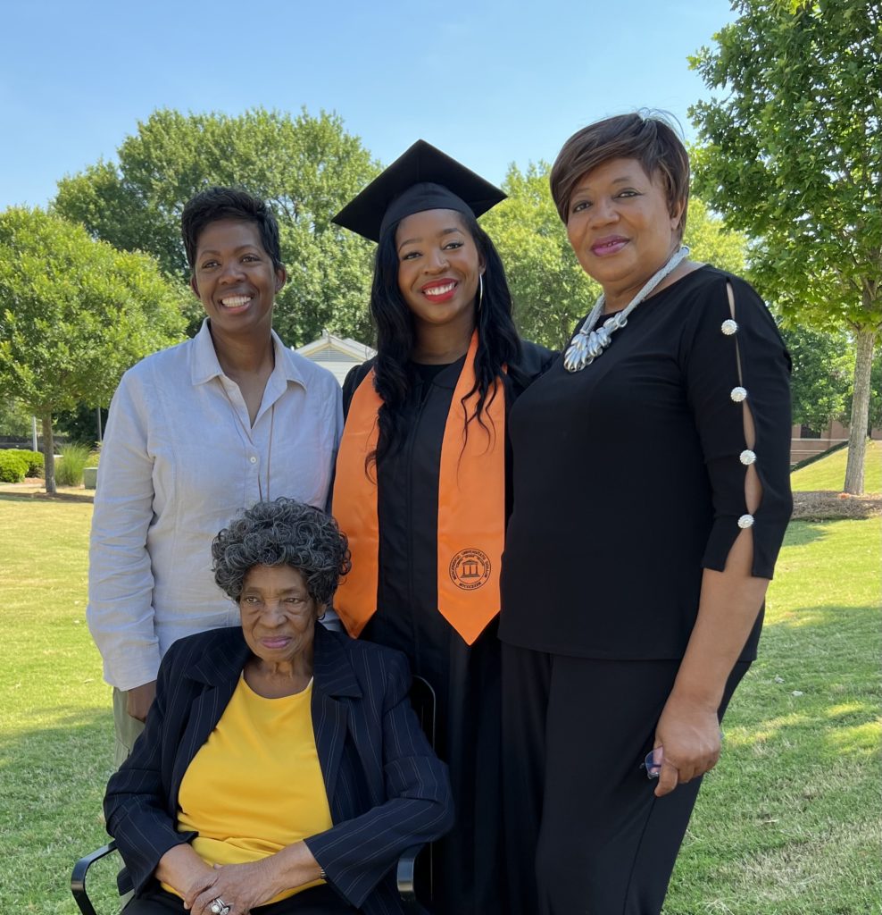 Victoria Whitehead and her family at her commencement in May 2022.