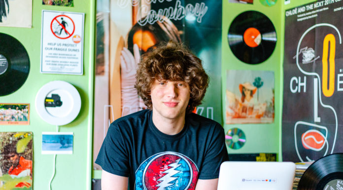 Mercer freshman opens record store in Mercer Village Noah Silver in his record store