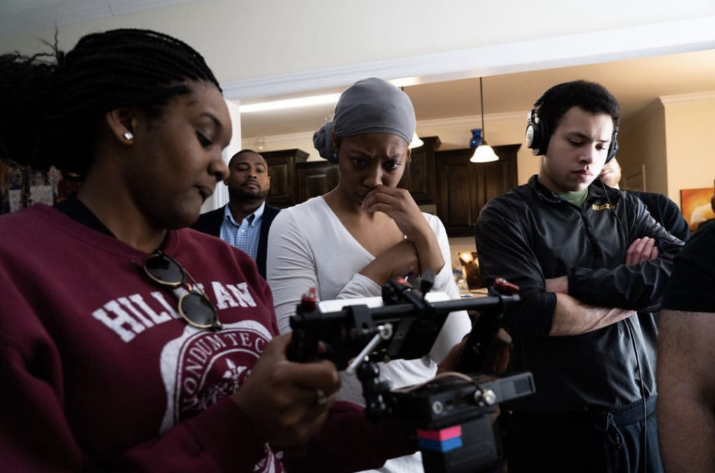 Tiffani Alexander (center) works on her film, "The Tale of 2 Music Cities."